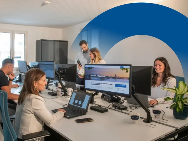 The Infotel Software teams at work in their offices
